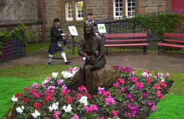 Pipers playing at opening of Garden